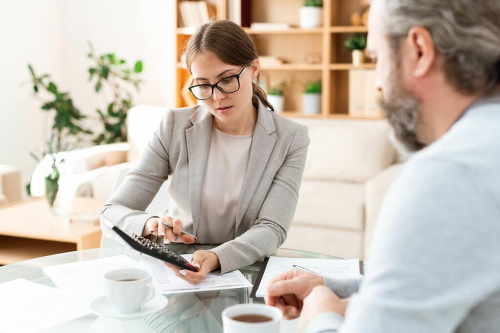 accountant showing a calculator