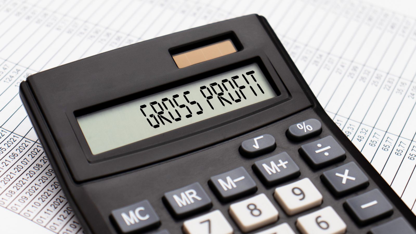 calculator showing the words "Gross Profit" for needing an accountant for starting a business.